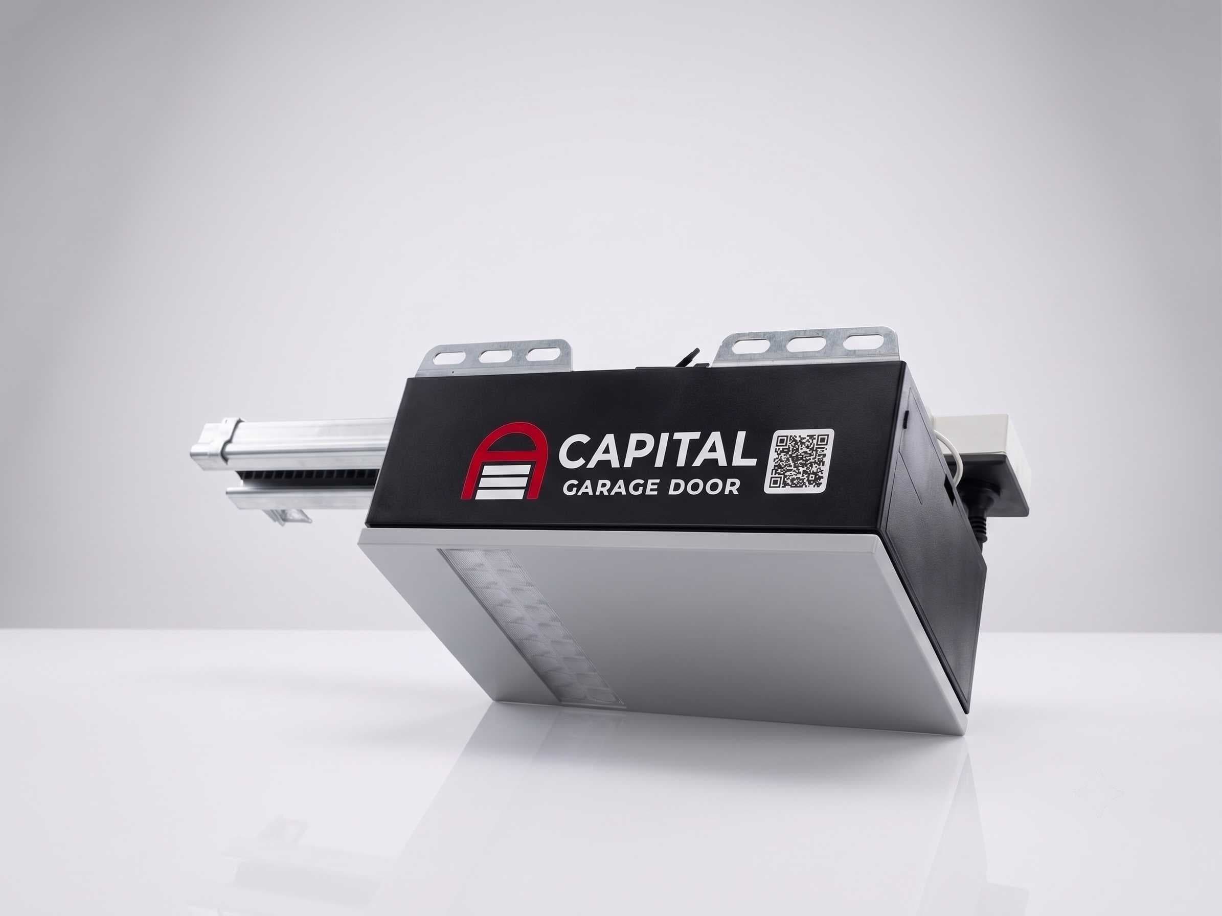 Capital garage door motor head unit with belt rail — white studio shot